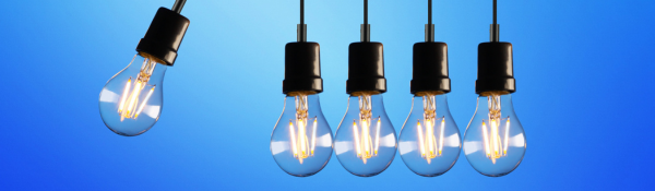 Glowing light bulbs symbolising innovation in managed security services